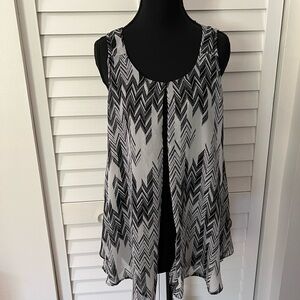 New Directions Black and White Asymmetrical Sleeveless Blouse